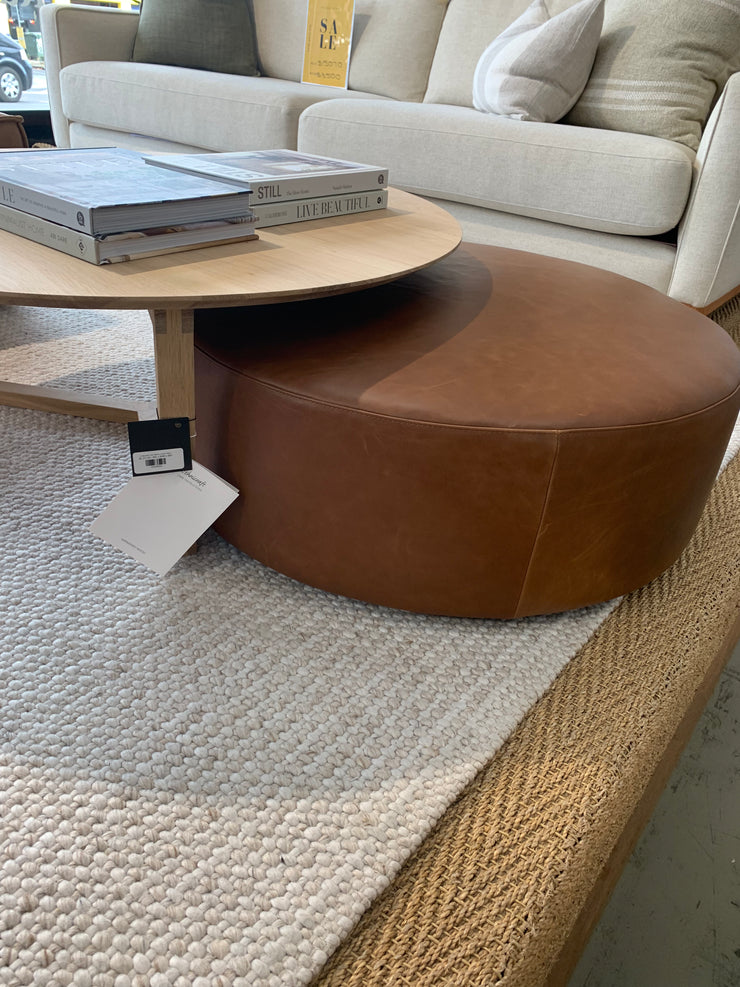 CIRCLE LOW LINE OTTOMAN- SETTLER TAPA TAN LEATHER